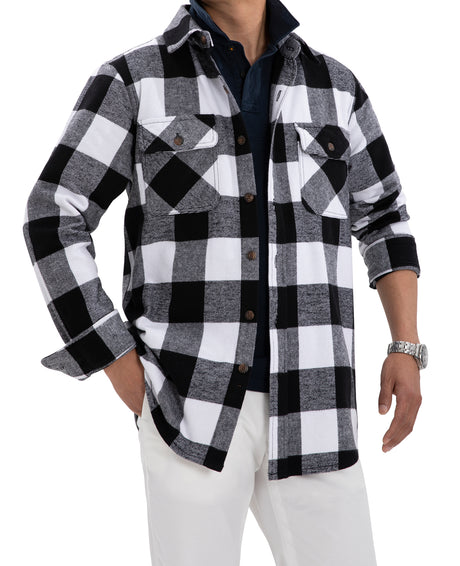 A man with one hand in his pockets in a black white stalwart cotton flannel shirt for men