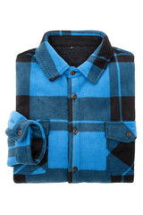 A high view of folded blue black men's cozy button plaid shirt jacket with sherpa lining