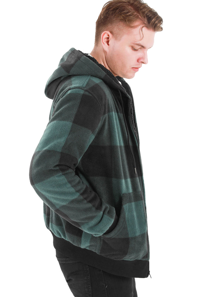 Side view of a man in a green men's thick sherpa lined plaid hoodie